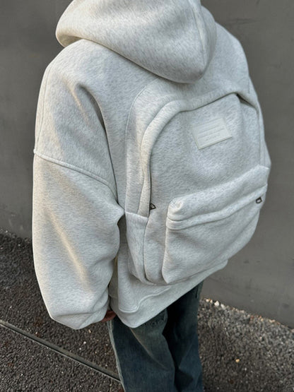 Oversized hoodie with built-in backpack